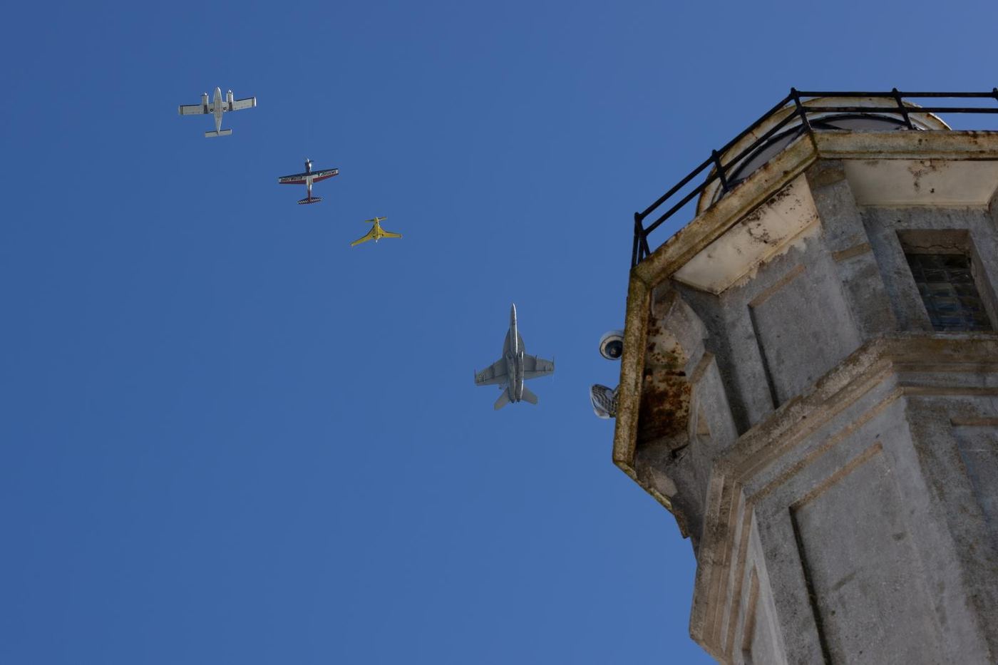 Aircraft formation above coastal structure